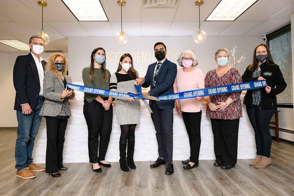 Staff of DiCicco Dental and Chamber members during ribbon cutting